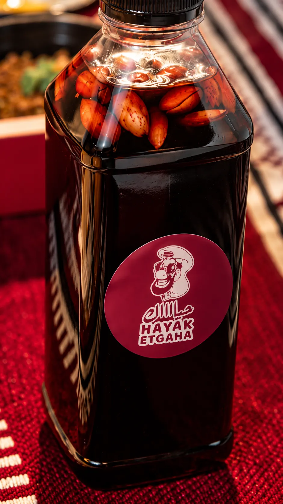 A Hayak bottle wearing the mascot sticker