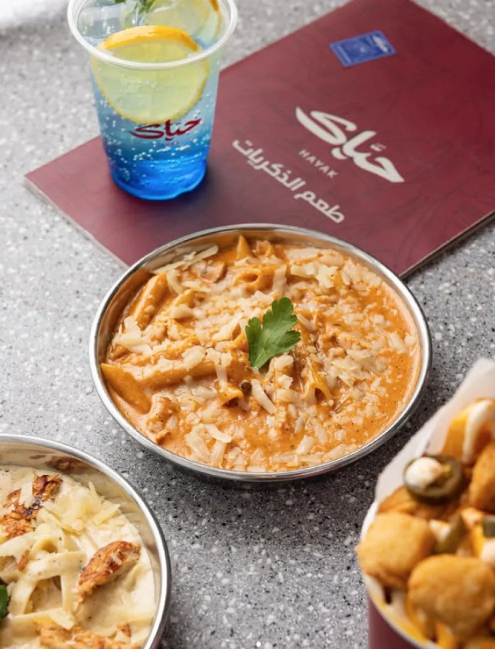 Hayak pasta with a mango drink