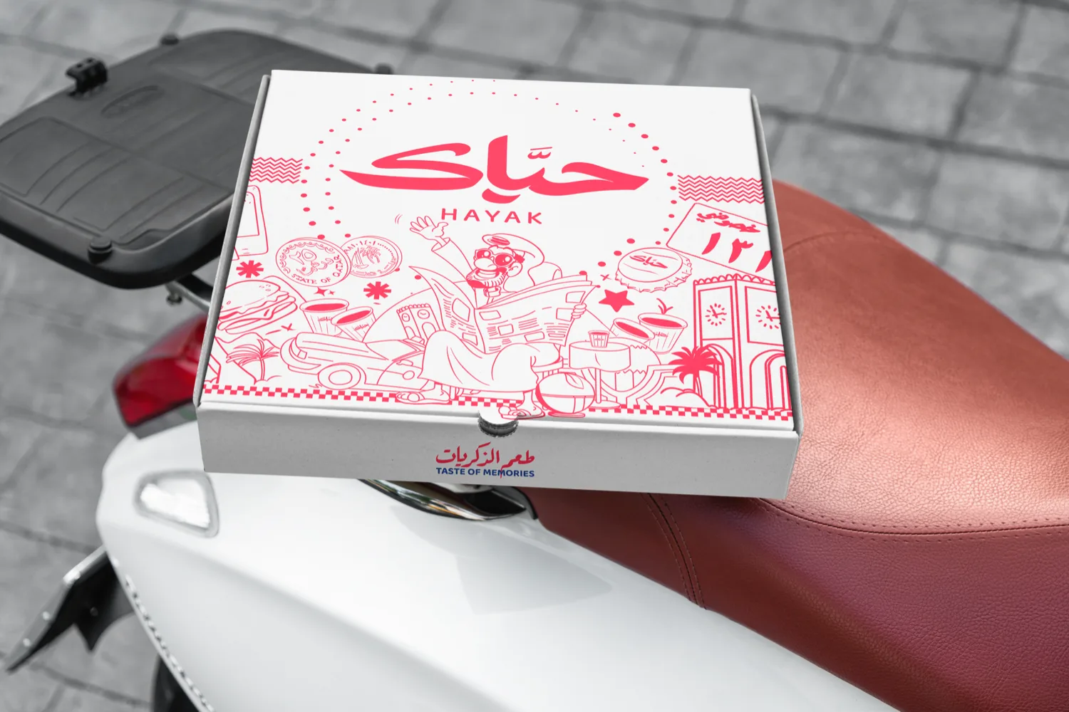 Hayak pizza box carried on a delivery scooter