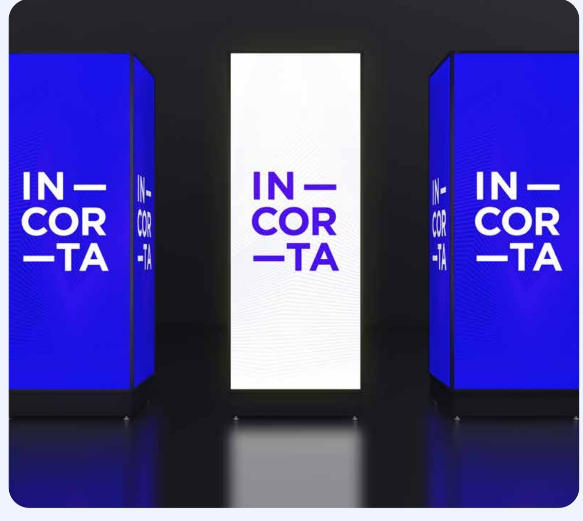 Illuminated IN—COR—TA logo lightboxes designed to line the ballroom