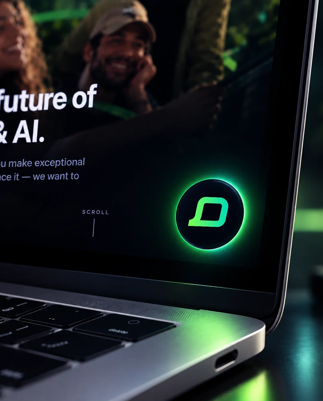 The Mojeeb chat button glowing green in the corner of a laptop screen