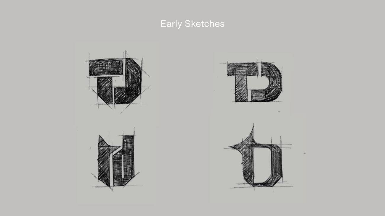 Early T&D logo sketches — refined studies