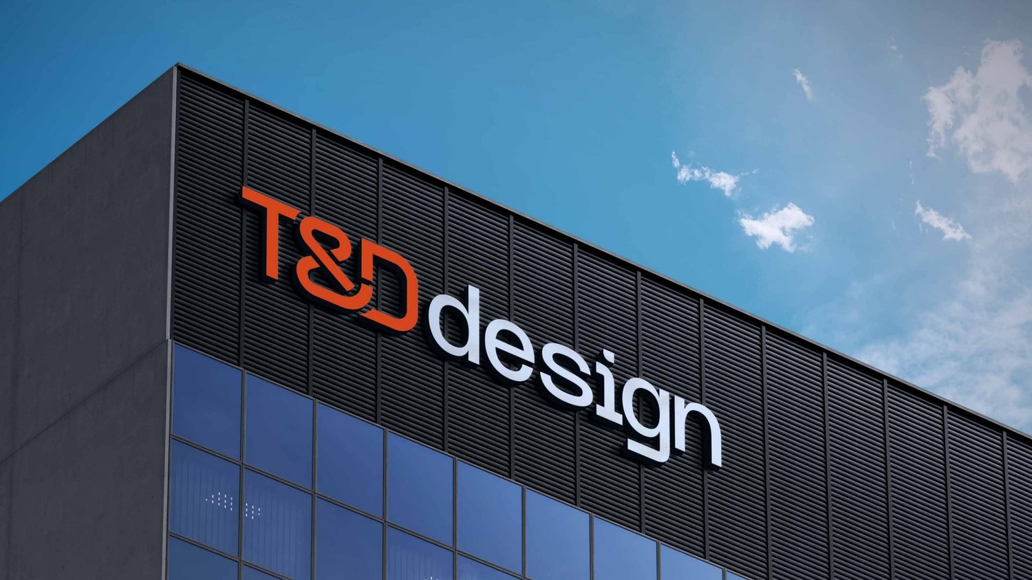 T&D design logo on a building facade