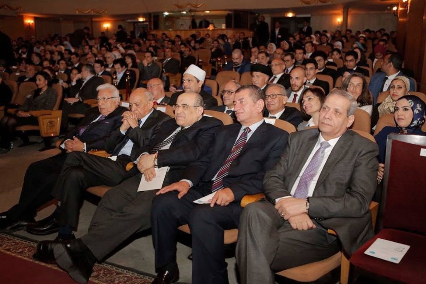 Scholars and dignitaries watching the memorial programme